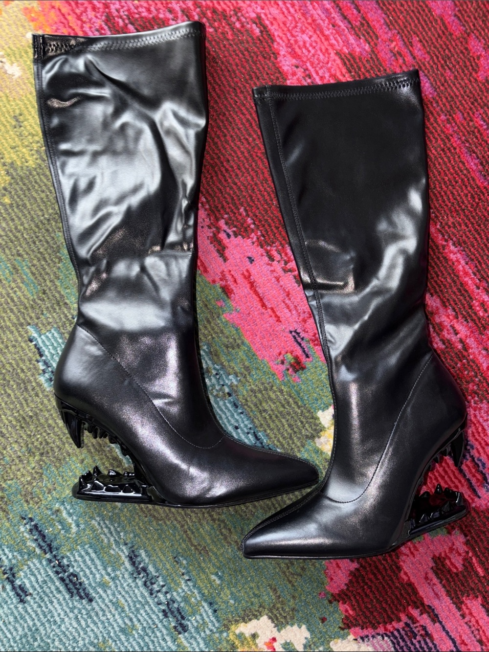Pointed Knee-High Black Heeled Boots with Sculptural Cutout Wedge